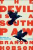 Book cover for "The devil is a Southpaw".