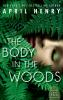 Book cover for "The body in the woods".