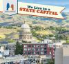 Book cover for "We Live in a State Capital".