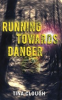 Book cover for "Running Towards Danger".