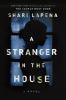 Book cover for "A stranger in the house".